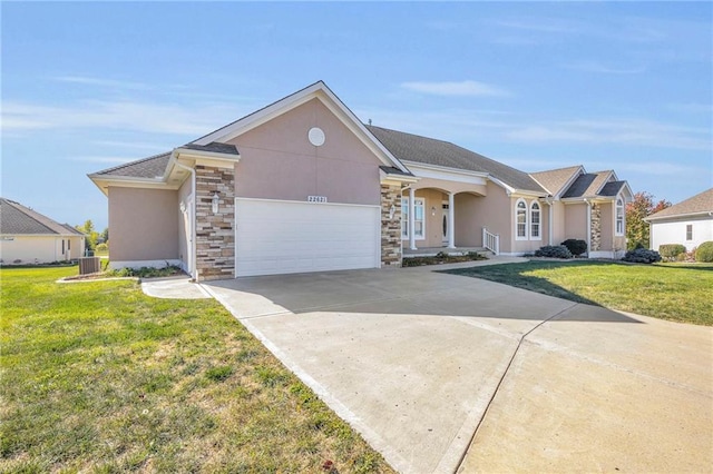 single story home featuring a front lawn, central AC, and a garage