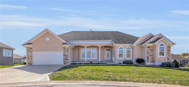 ranch-style house with a front yard and a garage