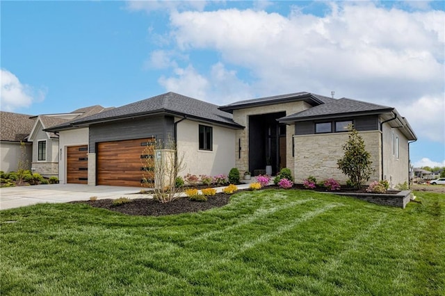 4511 W 136th St, Leawood, KS 66224 - prairie-style home featuring concrete driveway, stone siding, a shingled roof, an attached garage, and a front lawn