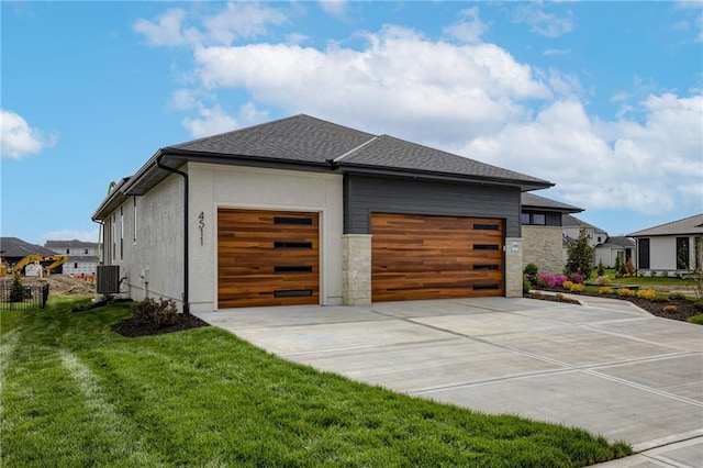 4511 W 136th St, Leawood, KS 66224 - view of home's exterior with a yard, a shingled roof, cooling unit, concrete driveway, and an attached garage
