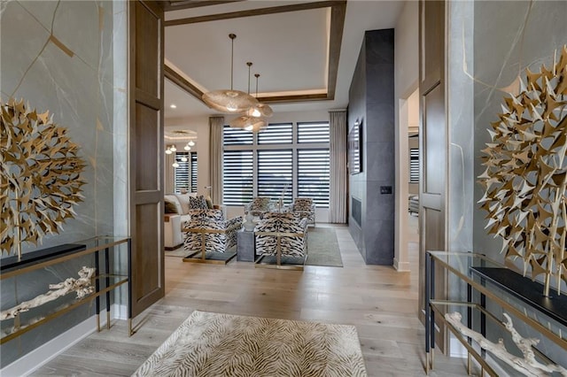 4511 W 136th St, Leawood, KS 66224 - hall with a towering ceiling and light wood-style flooring