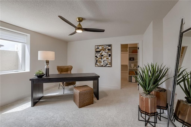 4511 W 136th St, Leawood, KS 66224 - office area with a textured ceiling, ceiling fan, light colored carpet, and baseboards