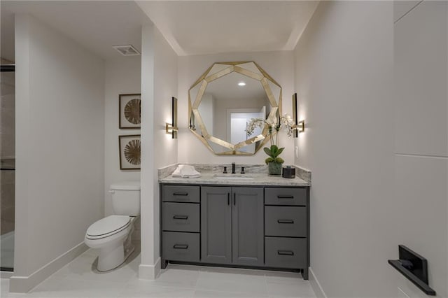 4511 W 136th St, Leawood, KS 66224 - bathroom featuring walk in shower, toilet, vanity, baseboards, and visible vents