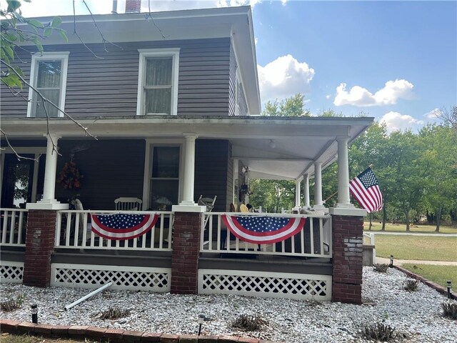 view of front of home featuring covered porch