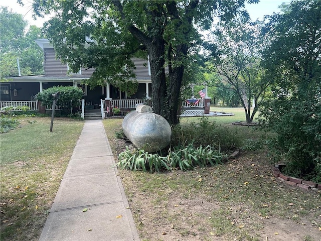 view of yard featuring a porch