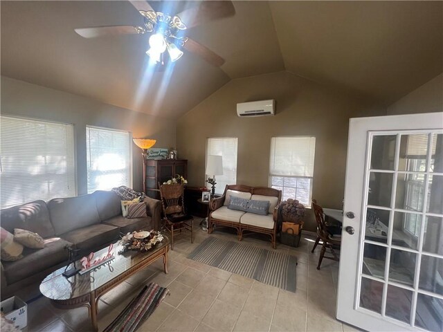 living room featuring a wall mounted AC, ceiling fan, light tile patterned floors, and vaulted ceiling