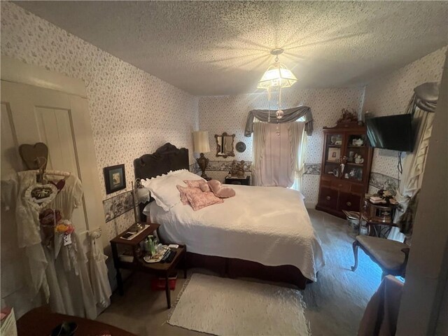 bedroom featuring a textured ceiling