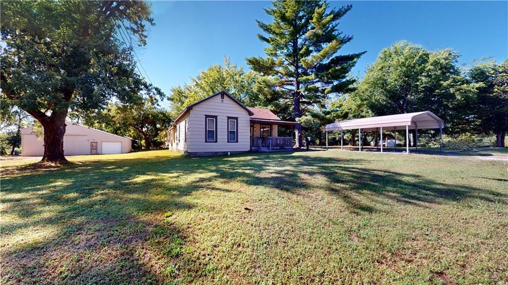 view of yard featuring a carport