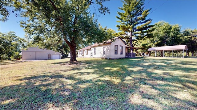 view of yard with a carport