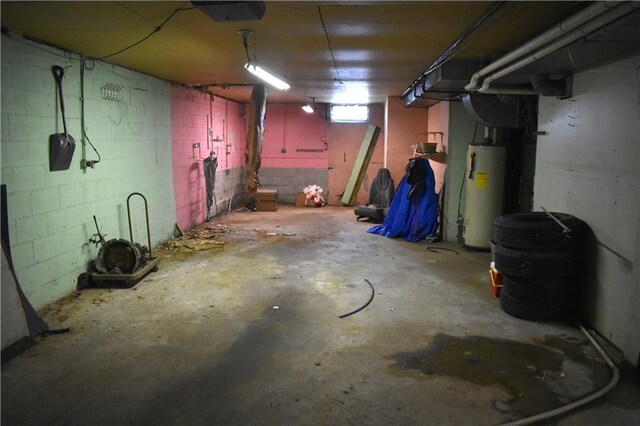 basement featuring water heater