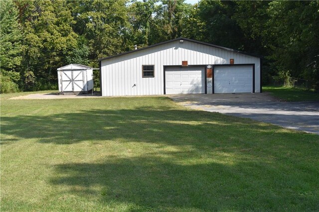 garage featuring a yard