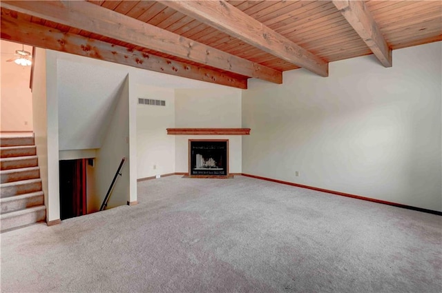 unfurnished living room featuring visible vents, carpet, and wood ceiling