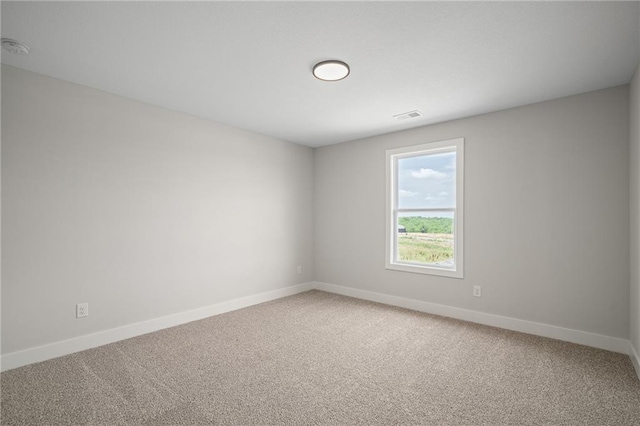 25010 W 142nd St, Olathe, KS 66061 - spare room with light carpet and a smoke detector
