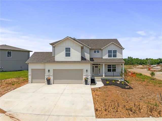 25010 W 142nd St, Olathe, KS 66061 - view of front of house featuring a porch, driveway, board and batten siding, and a shingled roof