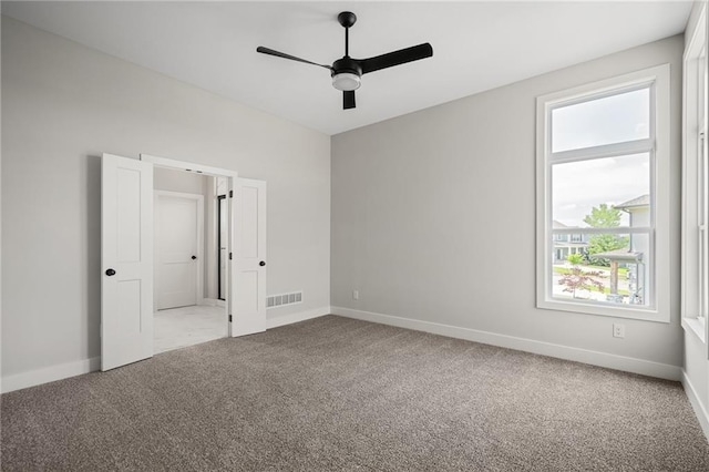 25010 W 142nd St, Olathe, KS 66061 - unfurnished bedroom featuring carpet and ceiling fan