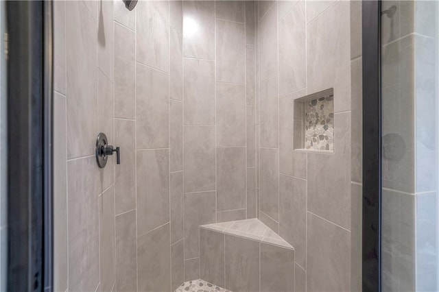 bathroom featuring a shower stall