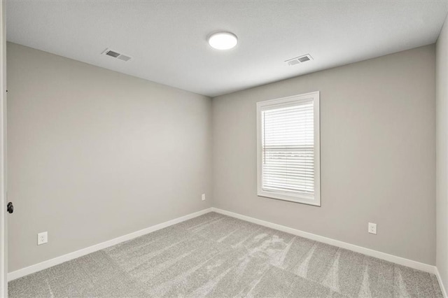 empty room with light carpet