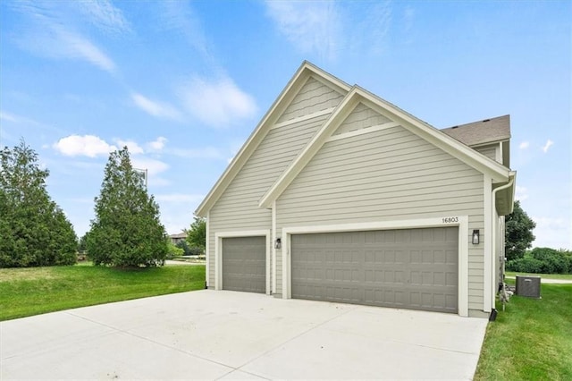 view of side of property with a yard