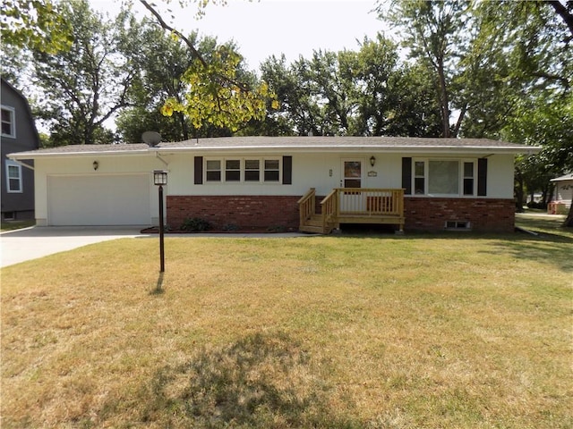 ranch-style home with a front yard, concrete driveway, brick siding, and a garage