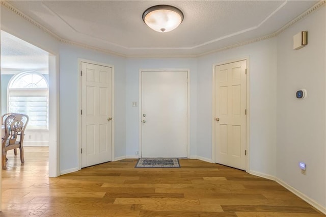 entryway with light hardwood / wood-style floors