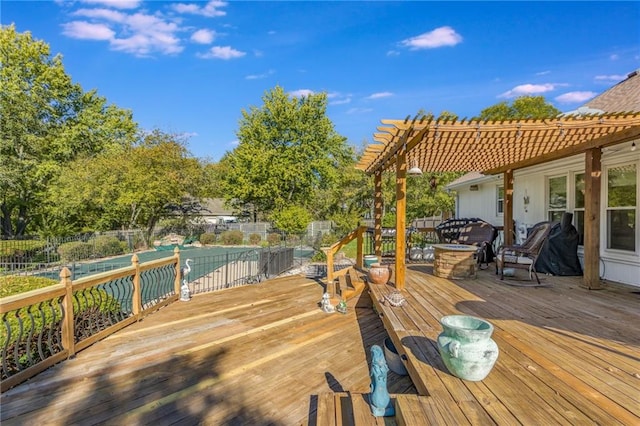 deck featuring a pergola