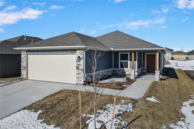 view of front of house featuring a garage and a porch