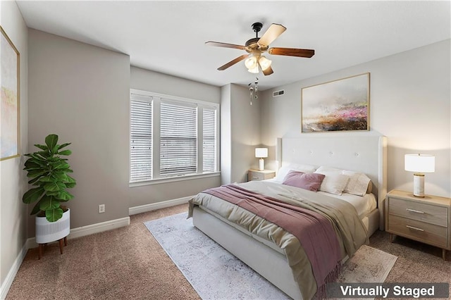 carpeted bedroom featuring ceiling fan