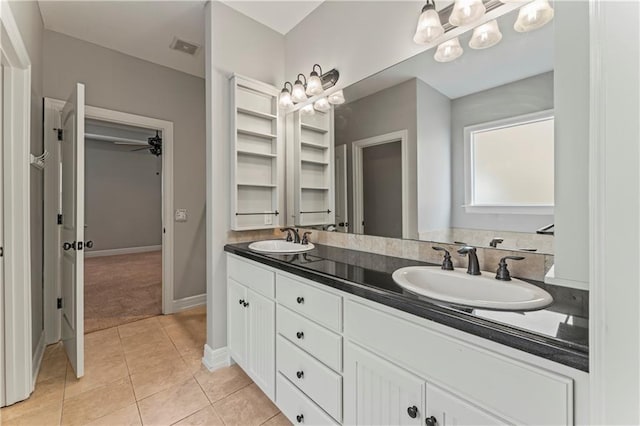 bathroom featuring vanity, ceiling fan, and tile patterned floors