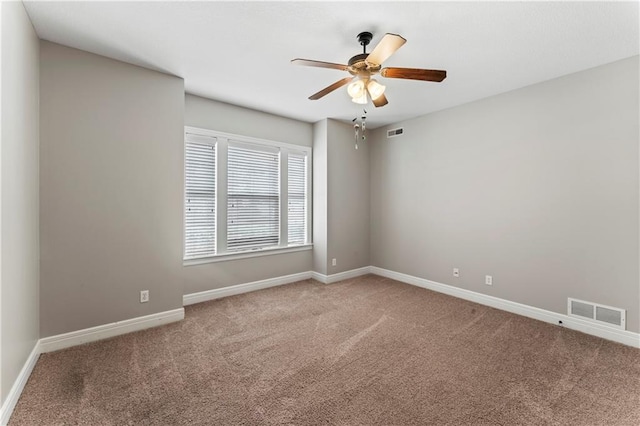 carpeted empty room with ceiling fan