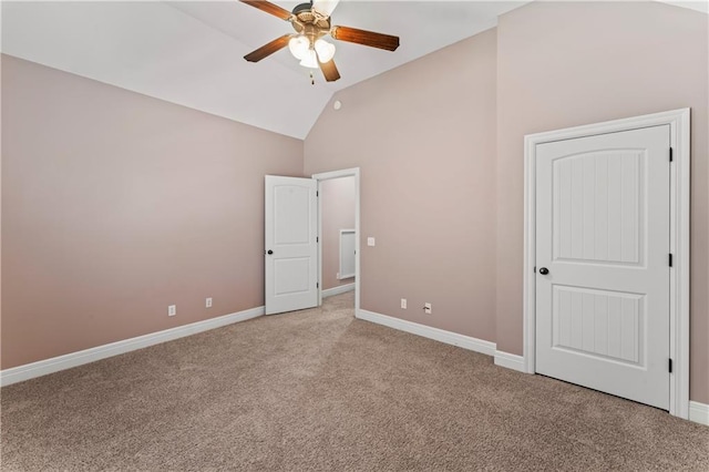 unfurnished bedroom with light carpet, lofted ceiling, and ceiling fan