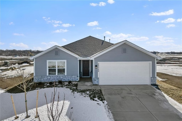 single story home featuring a garage