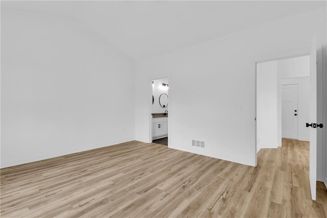 unfurnished room featuring light hardwood / wood-style flooring