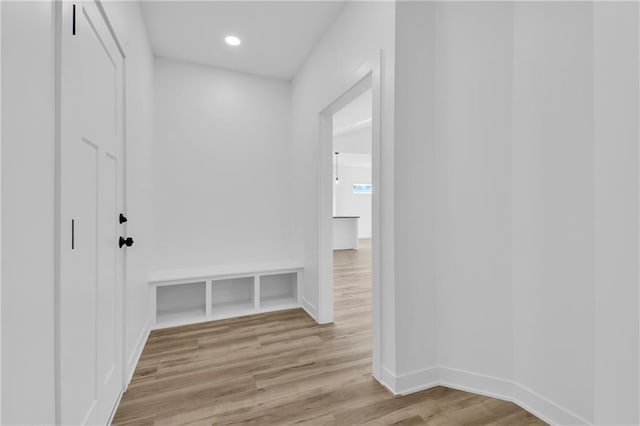 hallway featuring light hardwood / wood-style flooring