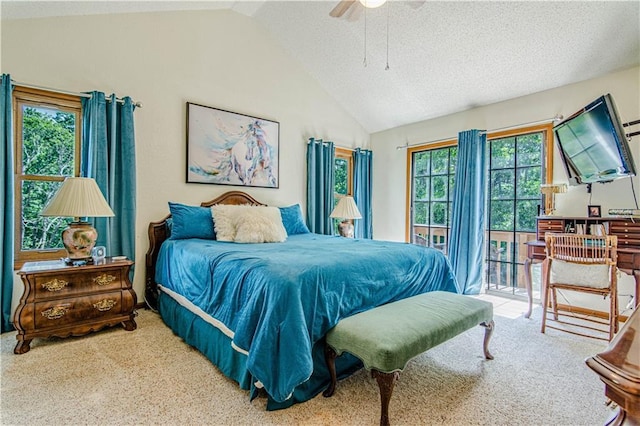 carpeted bedroom with ceiling fan, access to outside, a textured ceiling, and lofted ceiling