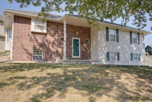 bi-level home with a front yard