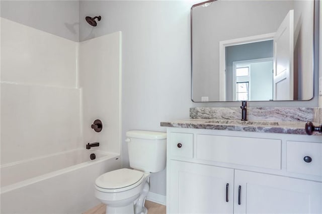 full bathroom featuring vanity, toilet, and shower / bathtub combination