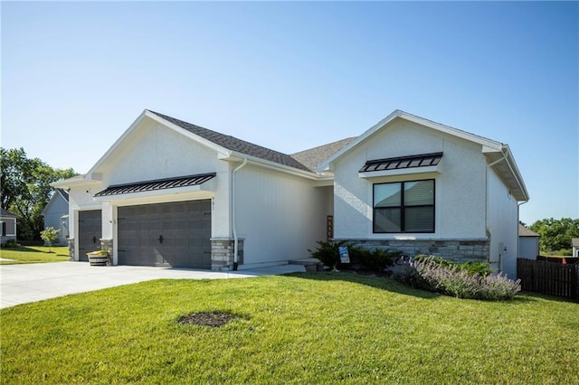 modern inspired farmhouse with a garage and a front lawn