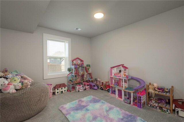 playroom featuring carpet flooring