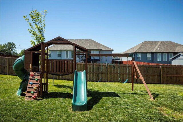 view of playground with a yard