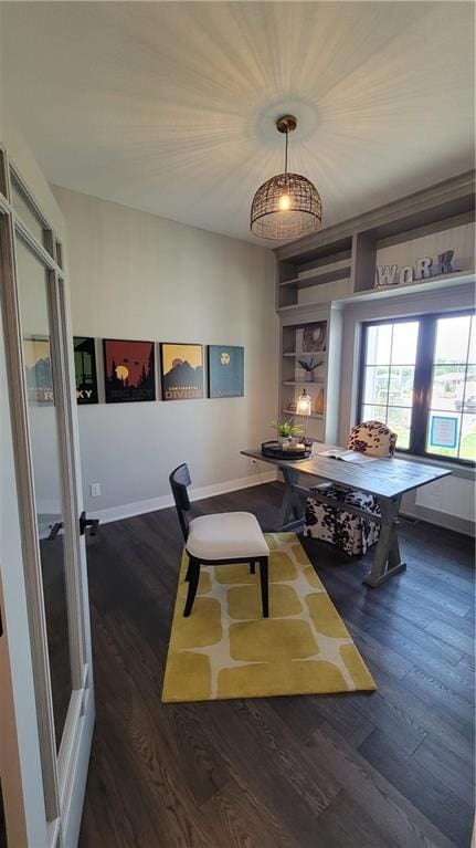 dining area featuring breakfast area and dark hardwood / wood-style flooring