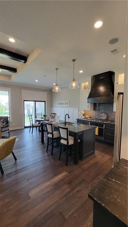 dining room with dark wood-type flooring and sink