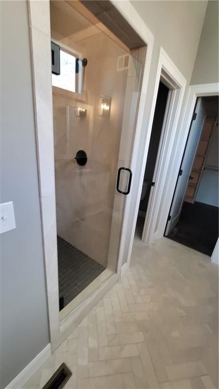 bathroom with an enclosed shower