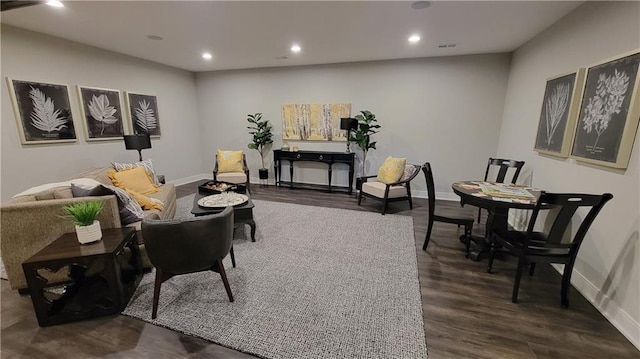 living room featuring dark hardwood / wood-style floors