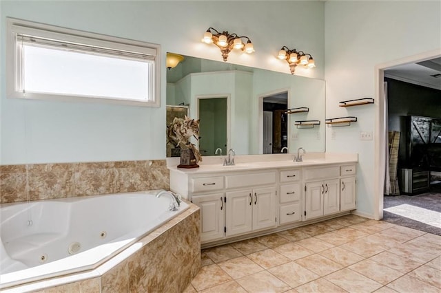 bathroom featuring a relaxing tiled tub, tile patterned flooring, and vanity