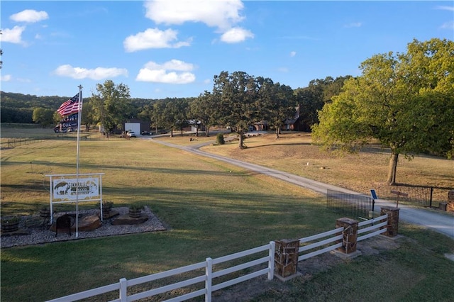 view of home's community featuring a lawn