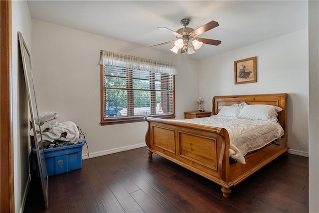 bedroom featuring ceiling fan and dark hardwood / wood-style floors