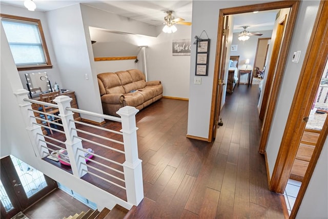 hallway with dark wood-type flooring