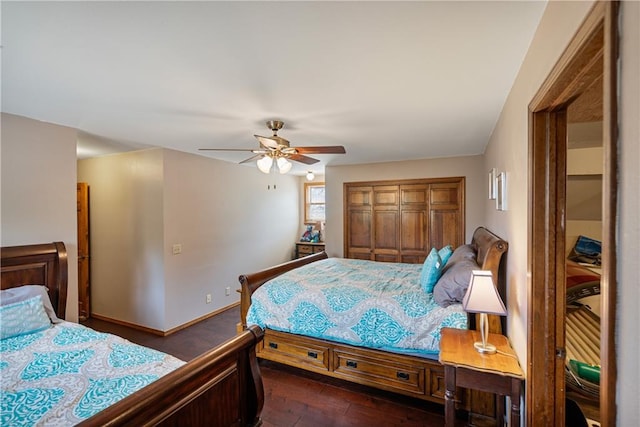 bedroom featuring ceiling fan, a closet, and dark hardwood / wood-style flooring