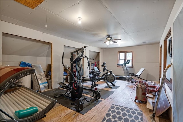 workout room featuring ceiling fan