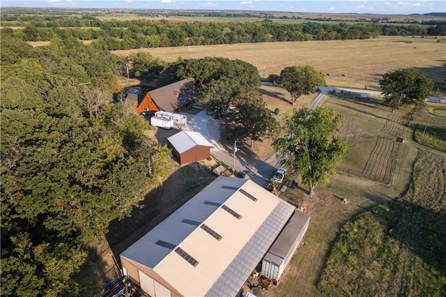 birds eye view of property featuring a rural view